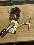 Vintage Zebco 6020 Gold Fishing Spinning Reel - Japan Convertible Handle. Fixed Price $18.00.