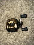 Shimano Coriolis CO-100E Baitcasting Fishing Reel Gold Black. Fixed Price $49.95.