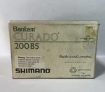 Shimano Curado Bantam CU-200B5 Baitcasting Reel Near Mint Complete Box + Papers. Fixed Price $280.00.