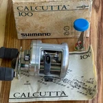Shimano 1992 Calcutta 100 Vintage Baitcaster - Complete Box Manual Accessories. Fixed Price $129.00.