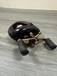 Abu Garcia MX200 Baitcaster Reel Black/gold Right Hand Retrieve. Fixed Price $104.99.