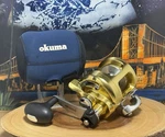 Okuma Titus Gold TG10 Two Speed Fishing Reel W/neoprene Pouch Case, Nice. Fixed Price $249.95.