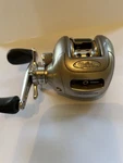 Bass Pro Shops Johnny Morris Signature Series JMP10H Bait Cast Reel. Fixed Price $42.50.