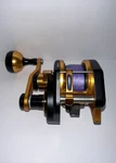 Wiki Jigging Baitcasting Righthanded Reel Violent Slow 1500XH Black/gold. Fixed Price $700.00.