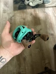 13 Fishing Concept Baitcast Reel Seafoam Green TX2-7.5-LH. Fixed Price $250.00.