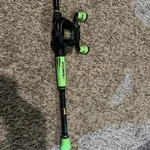 Lews Mach 2 Baitcasting Combo And Lazer Rz Rod. Fixed Price $160.00.