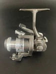 Mitchell Impact IM30T Spinning Reel. 5.57:1 Gear Ratio 4 Ball Bearing Right. Fixed Price $29.99.