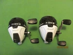 1 Pair Of Shakespeare Tiger Spin-casting Reels Spooled With Line. White & Black.. Fixed Price $32.95.