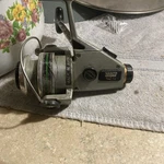 Fishing Reels- New Vintage Zebco Omega 940XL Spin (circa 1970'S). Fixed Price $350.00.