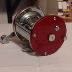 Penn Jigmaster 500S Vintage Casting Fishing Reel Red. Fixed Price $30.00.