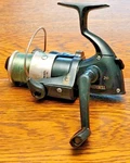Mitchell Outback 20 Fishing Spinning Reel Green 5.0 Ratio 145YD 8# Capacity. Fixed Price $14.99.