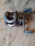 Lightly Used Aoqiusite AC200 Lh Level Wind Fishing Reel Fully Adjustable. Fixed Price $29.99.