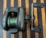 Vintage Shakespeare Axiom AX510 Baitcaster Fishing Reel #1215313. Fixed Price $9.50.