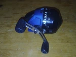 Vintage Shakespeare Tiger Blue/black Spincast Fishing Reel Push Button. Fixed Price $18.00.