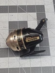 Vintage Daiwa Spincast Fishing Reel - Black & Bronze, Made Korea. Fixed Price $10.99.
