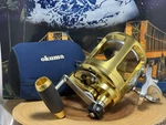 Okuma Titus Gold TG50 Two Speed Fishing Reel W/neoprene Pouch, Un Fished Cond. Fixed Price $550.00.