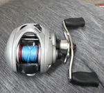 Ozark Trail Gen. 2.0 Baitcast Reel Silver Red Black Fishing. Fixed Price $25.00.