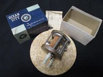 Vintage Ocean City No 1581 Model B, Tan (mint) Casting Reel W/box & Papers. Fixed Price $15.75.