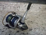 Okuma Spinning Reel Silver & Blue Safina SNA-25 (h). Fixed Price $19.99.