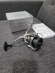 2023 Shimano Stradic C3000XG Spinning Reel. Fixed Price $230.00.