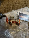 Sougayilang, Line Counting Trolling Reel, Orange, Left Hand. Fixed Price $95.99.