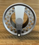 Unused Lamson Velocity VS3 Hard Alox Fly Reel Spare Spool. Fixed Price $65.00.