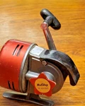 Vintage Holiday No. 64-253 Closed Face Spin Cast Fishing Reel. Fixed Price $14.99.