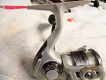 Pflueger Trion SP30 Spinning Reel. Fixed Price $28.00.