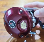 Abu Garcia 6501C3 Burgundy Model Left-handed Reel. Fixed Price $155.52.