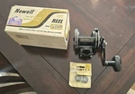 Newell C338-5 Fishing Reel With Clamp, Brake Kit. Fixed Price $225.00.
