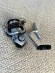 Shakespeare Alpha 3120 Spinning Reel. Fixed Price $21.99.