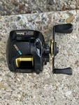 Lightly Used Daiwa PS2-5B Baitcast Reel With Flipping Switch. Fixed Price $24.99.