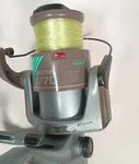 Silstar GF70 Long Cast Fishing Reel With Line Vintage. Convertable Handle. Fixed Price $38.00.