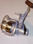 Pflueger Trion 4735 Spinning Reel, Bearing System, Gear Ratio 5.2-1. Fixed Price $28.00.