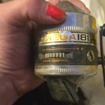 Zebco Omega 181 Spincast Reel W/ Drag Control, Silver/black/gold. Fixed Price $20.00.