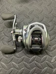 Bass Pro Shops Johnny Morris Platinum Signature Baitcast Reel JPT10HLA 6.8:1. Fixed Price $185.00.