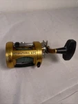 Penn International 975 Gold Reel Made Usa. Fixed Price $299.99.