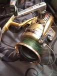 Mitchell Vintage Spinning Fishing Reel Gold With Green Line. Fixed Price $35.00.