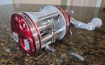 Abu Garcia Ambassadeur TGC6001C Reel Left Hand Maroon Euc. Fixed Price $95.00.
