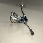 Vintage Rainbow Color Quantum Energy Pti 20 Mag Titanium Spinning Reel Read. Fixed Price $169.95.