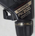 Shimano FX200 Quick Fire Ii R2 Spool Spinning Reel Good Condition Works. Fixed Price $19.95.