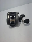 Shakespeare Axiom AX510 4 Bearing Bait Cast Reel. Fixed Price $9.00.