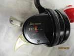 Vintage Johnson Fiskar Model 511 Black Spin Cast Fishing Reel. Fixed Price $45.00.