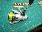 V8570 Pflueger Trion TR120 Ultra Light Spinning Fishing Reel. Fixed Price $31.95.