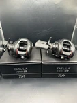 2 Daiwa Tatula Baitcast Fishing Reels 6.3:1 Left Hand Black TTU100HL. Fixed Price $200.00.