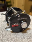 Daiwa Millionaire MM-1000 Bait Cast Reel Black & Silver Used. Fixed Price $140.50.