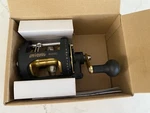 Pelagic Extreme Fishing Reel (PLDI0L) Line Capacity 20LB/300YDS Black/gold. Fixed Price $30.00.