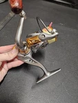 DC4000 Spinning Reel With Handle. Fixed Price $19.99.