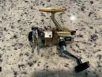 Vtg Zebco 6010 Spinning Fishing Reel Gold - Works Excellent. Fixed Price $15.98.