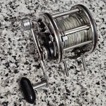 Garcia GK-64 Level Wind Fishing Reel W/line. Fixed Price $45.00.